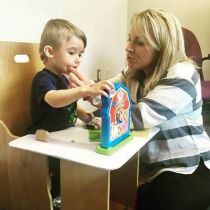 Speech Language Pathologist works with a JMCC client 