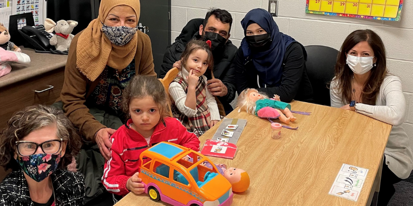 JMCC CEO Jessica Sartori (left) with interpreter Mozayan Diab (second left) members of the AlHariri family and Speech Language Pathologist Agapi Varacalli (right).