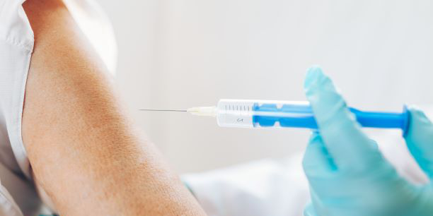 person getting a vaccine