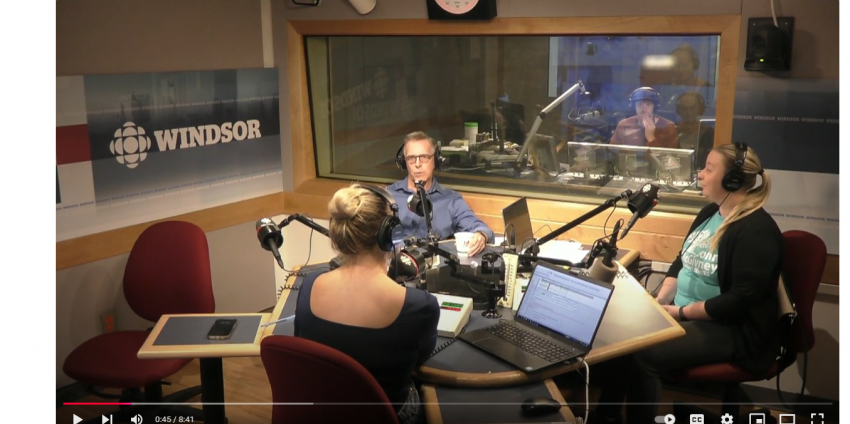 photo of Amy Dodge CBC Windsor Morning, Ted Crljenica, and Julie Olstrom sitting around a table at CBC newsroom