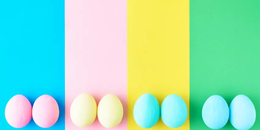 Pairs of pastel-colored eggs on matching blue, pink, yellow, and green background sections.