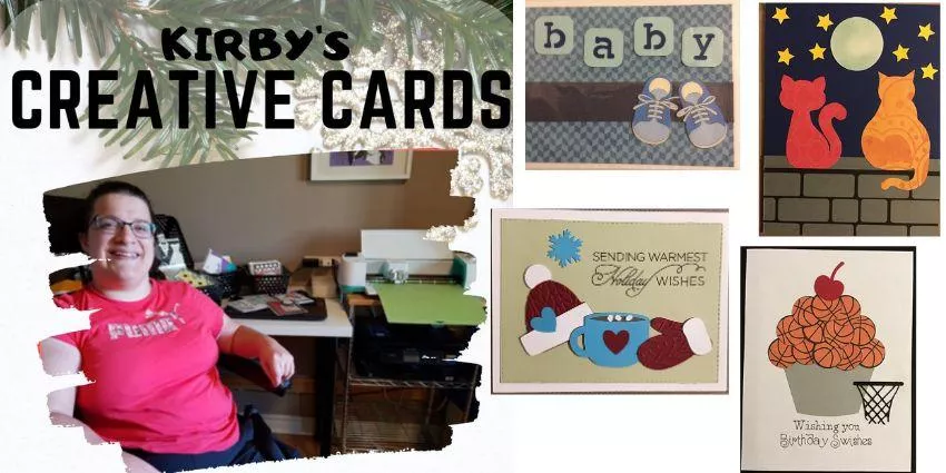 Woman sitting at a desk with crafting supplies and four handmade greeting cards displayed nearby.