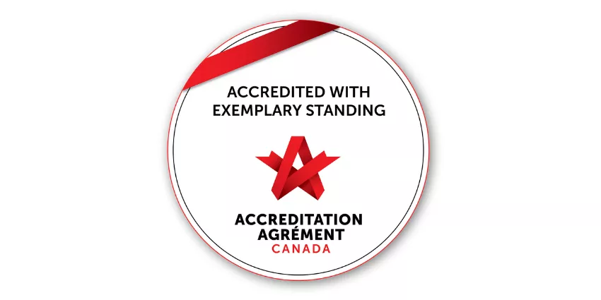 Accreditation Canada badge with exemplary standing and red ribbon at top center.