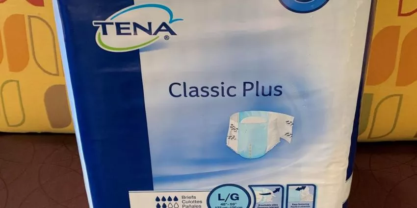 TENA Classic Plus adult briefs size L/G 48-59 inches with breathable sides and easy fastening.