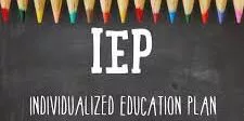 Colored pencils along chalkboard edge with IEP Individualized Education Plan text below.