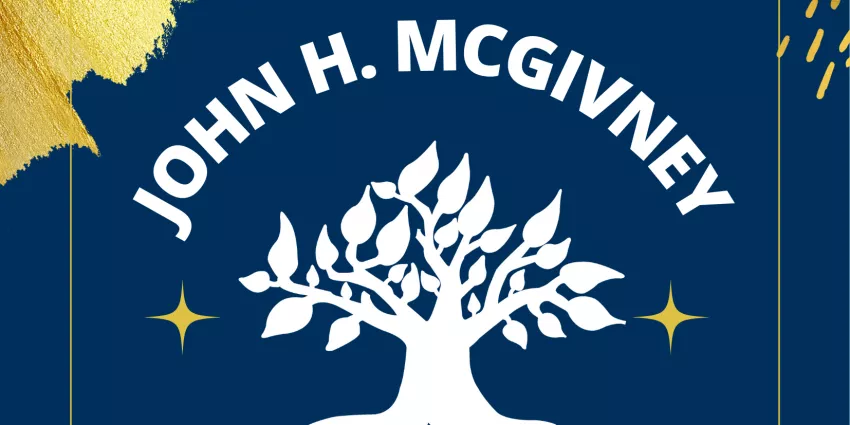 White tree with leaves and the name John H. McGivney on dark blue background with gold accents
